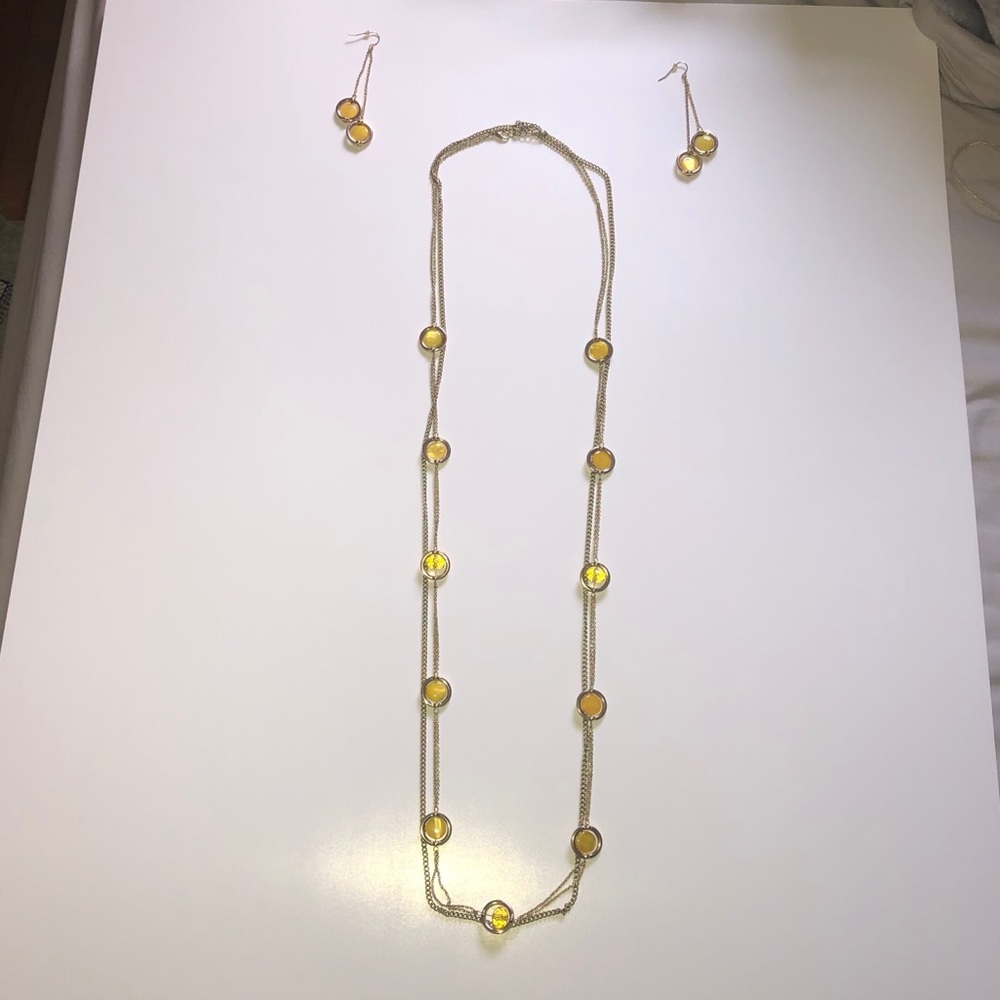 Yellow necklace with gold chain and earrings